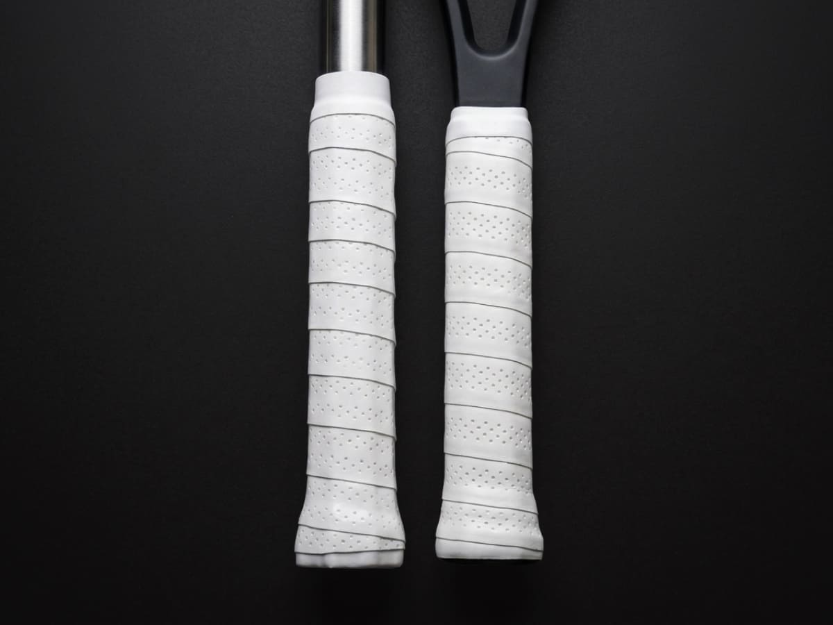 Swng overgrip on a SwngPro and a racket handle